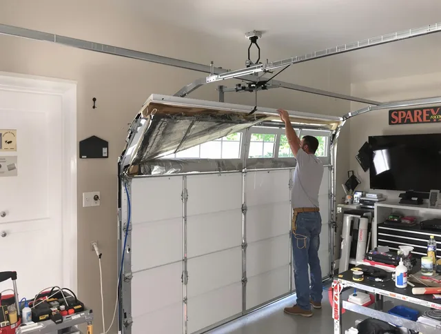Garage door section replacement by Torrington Garage Door Repair in Torrington