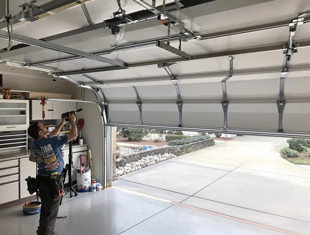 Garage door track repair service by Torrington Garage Door Repair in Torrington